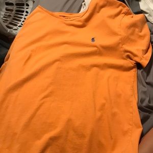 two shirts: american eagle and polo